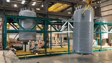 A time-lapse of Green Li-ion's recycling machines being installed in a large warehouse.
